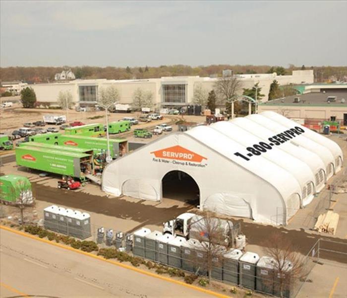 Bird's eye view of trucks and tent prepared for a large loss